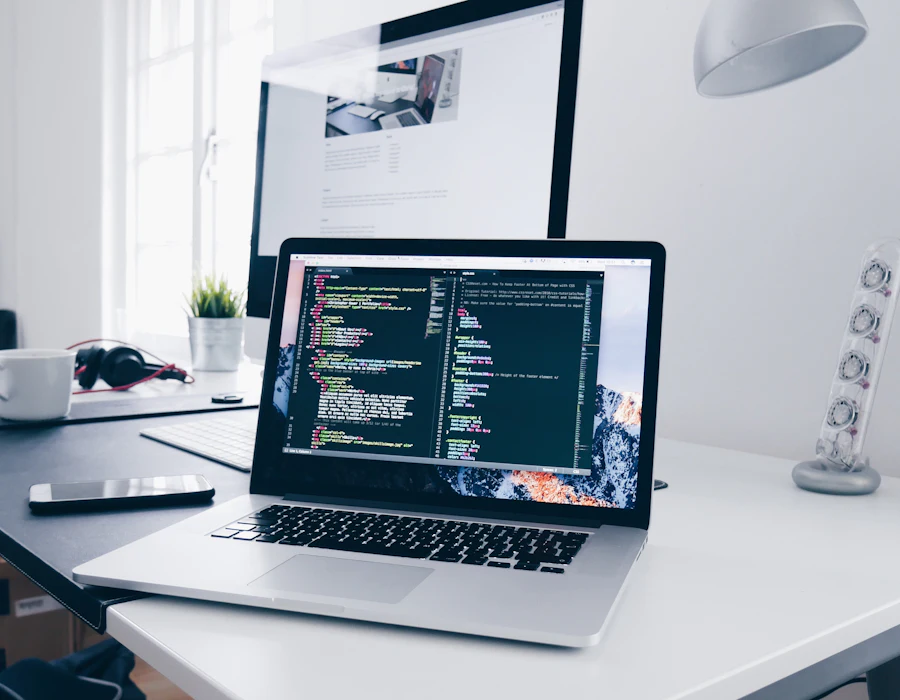 Developer building a marketing website on a laptop